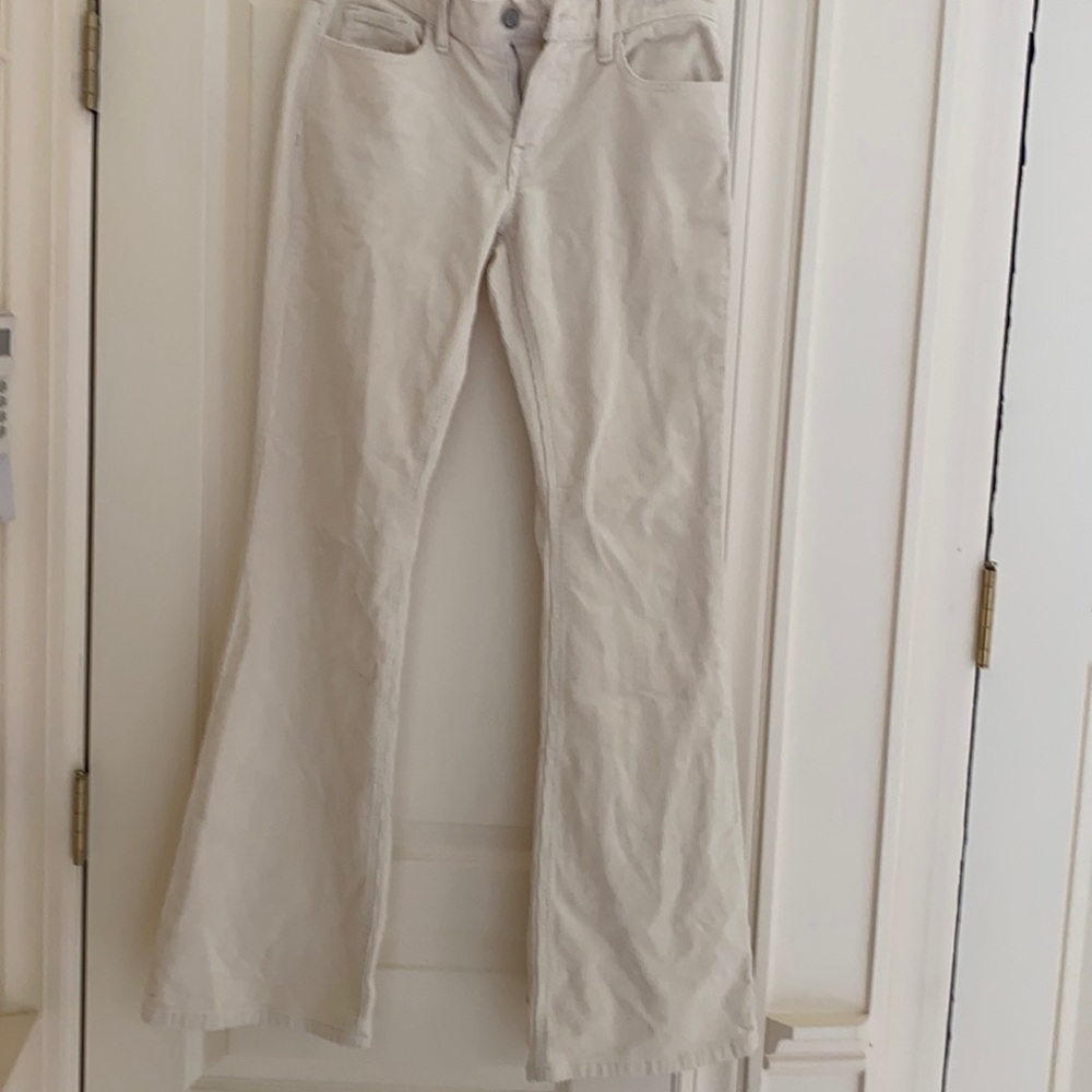 Cream color corduroy boot leg jeans